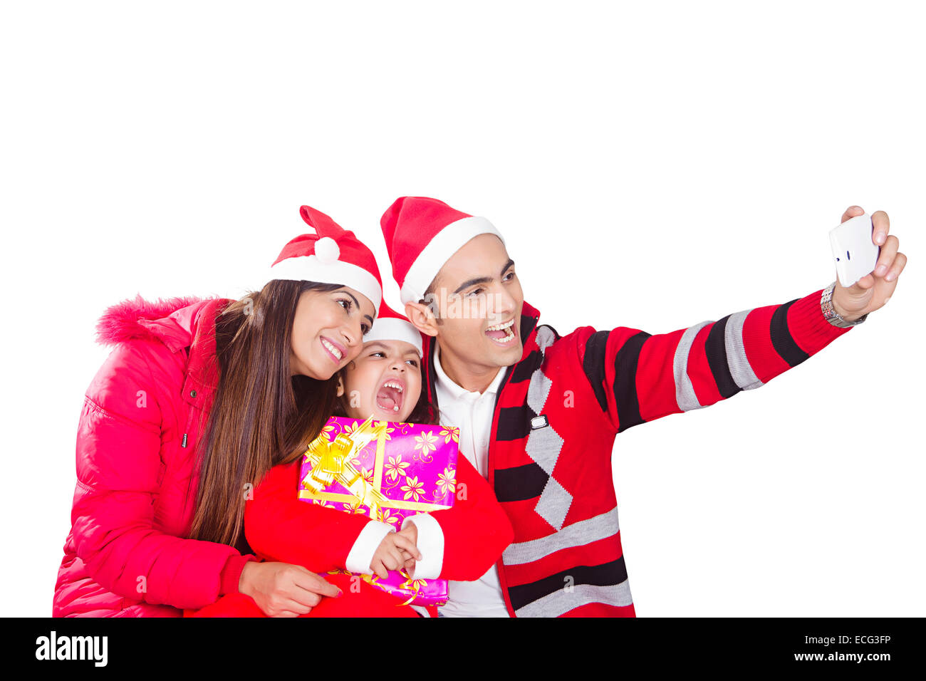 indische Geschenke mit Kind Christmas Festival Selfie Telefon Stockfoto