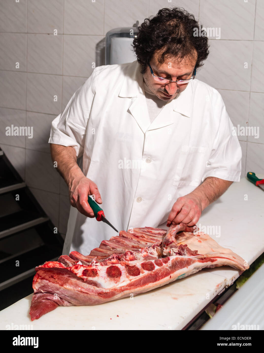 Echte sizilianische Metzger in Riposto Catania zu arbeiten Stockfoto