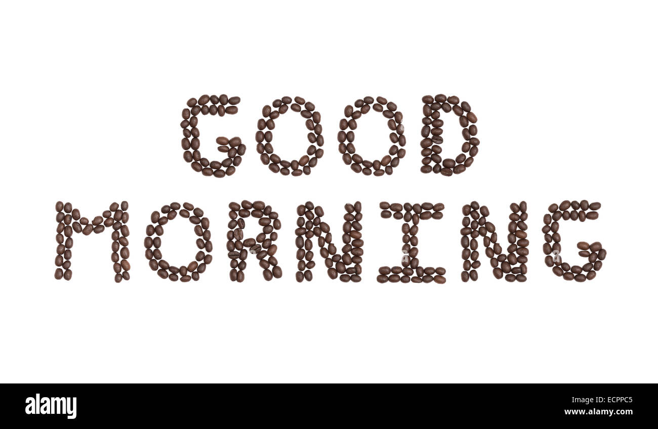 Die Worte "Guten Morgen", geschrieben mit Kaffeebohnen Stockfoto