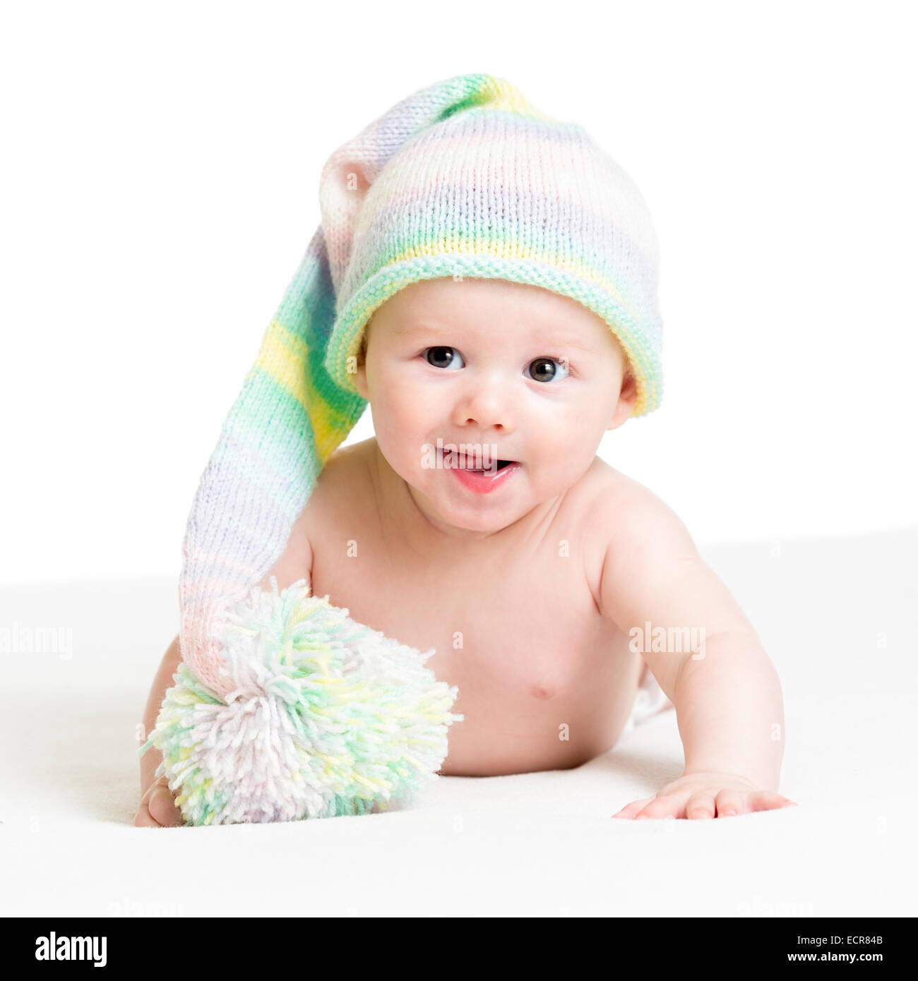 Smiling Baby jungen Säugling in lustigen Hut Stockfoto