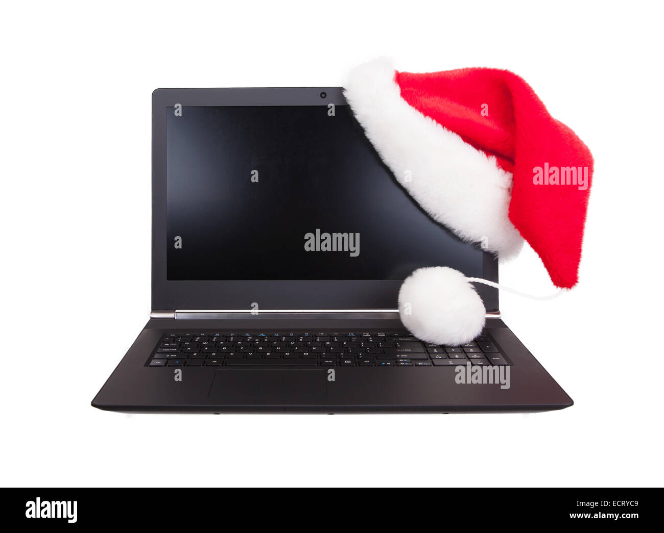 Moderne offene Laptop mit roten Weihnachtsmann-Hut aufsetzen LCD-Ecke, isoliert auf weiss Stockfoto