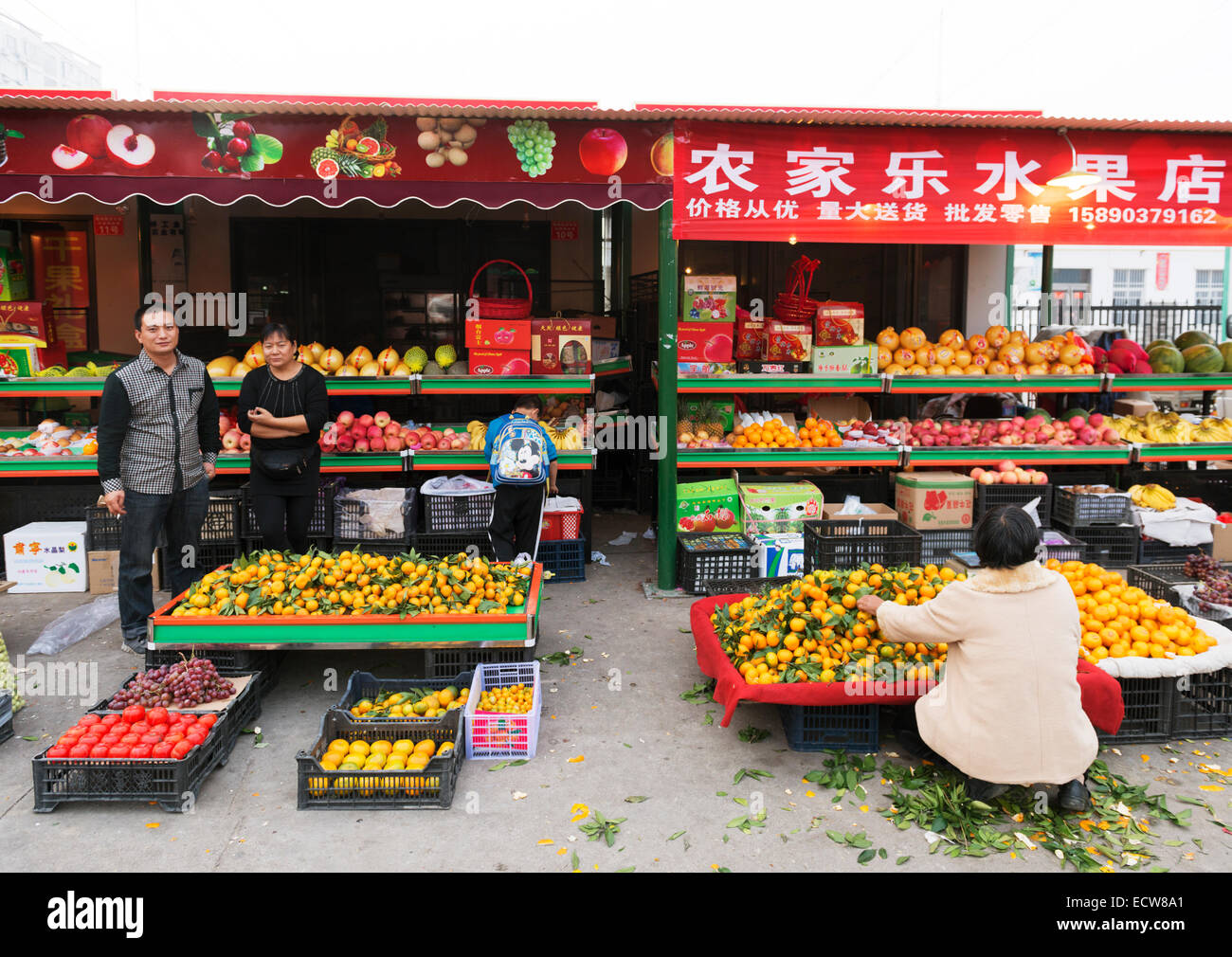 Menschen auf einen Lebensmittelmarkt in Zhengzhou, Henan, China Stockfoto