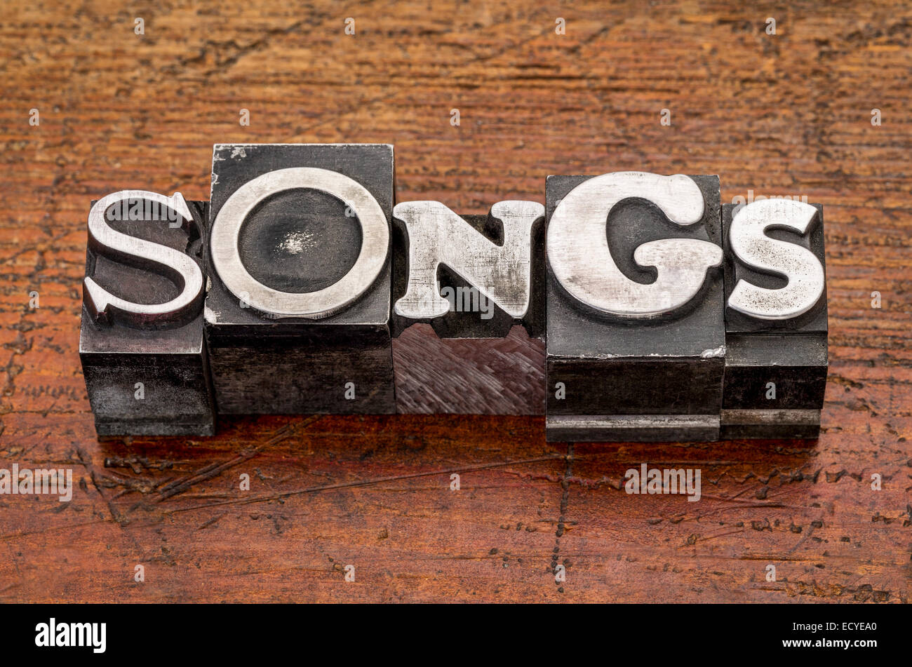 Lieder Wort in Vintage Metall Mischtyp Druckstöcke über Grunge Holz Stockfoto