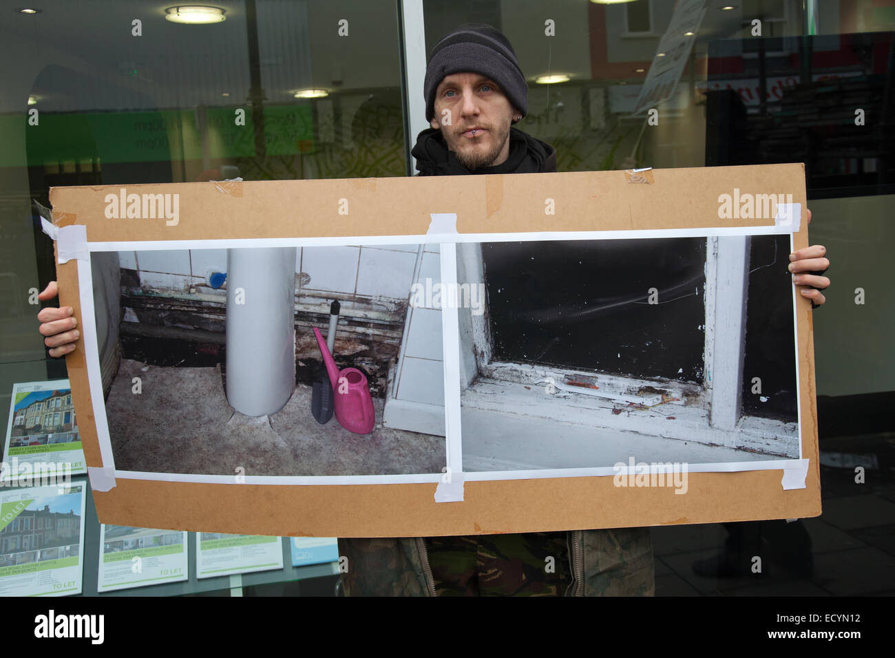 Bristol, UK. 22. Dezember 2014. Aktivisten gegen verfallenen Gehäuse in Bristol protestieren außerhalb CEA Immobilienmakler in Gloucester Road, Bristol, Bristol Credit: Redorbital Fotografie/Alamy Live News Stockfoto