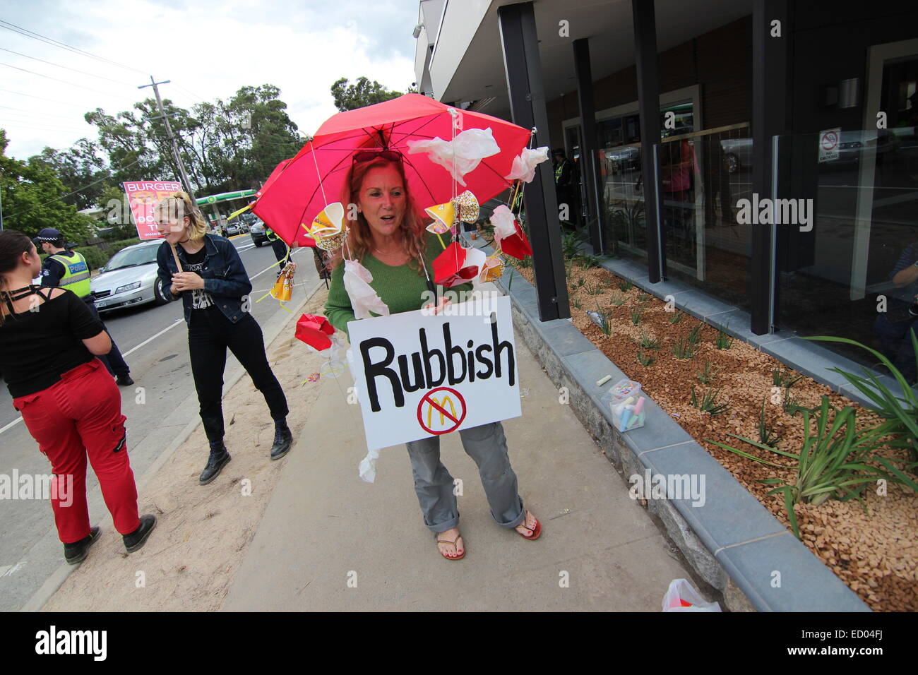 Kein McDonalds in Tecoma Demonstrant verkleidete sich als Fast-Food Müll Stockfoto