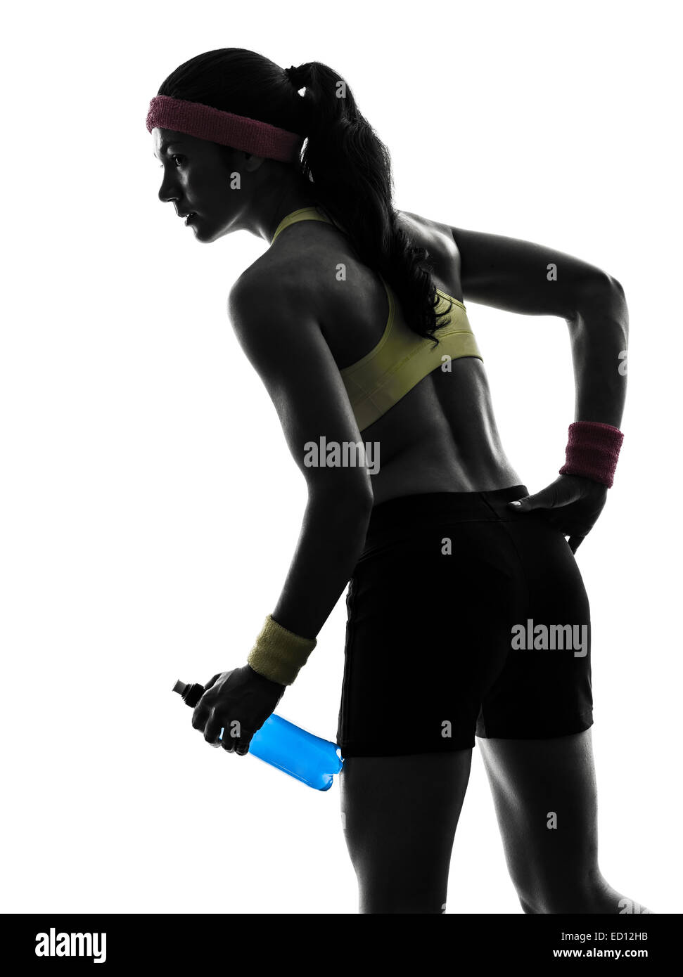 eine Frau, die Ausübung Fitness mit Energy-Drink in Silhouette auf weißem Hintergrund Stockfoto
