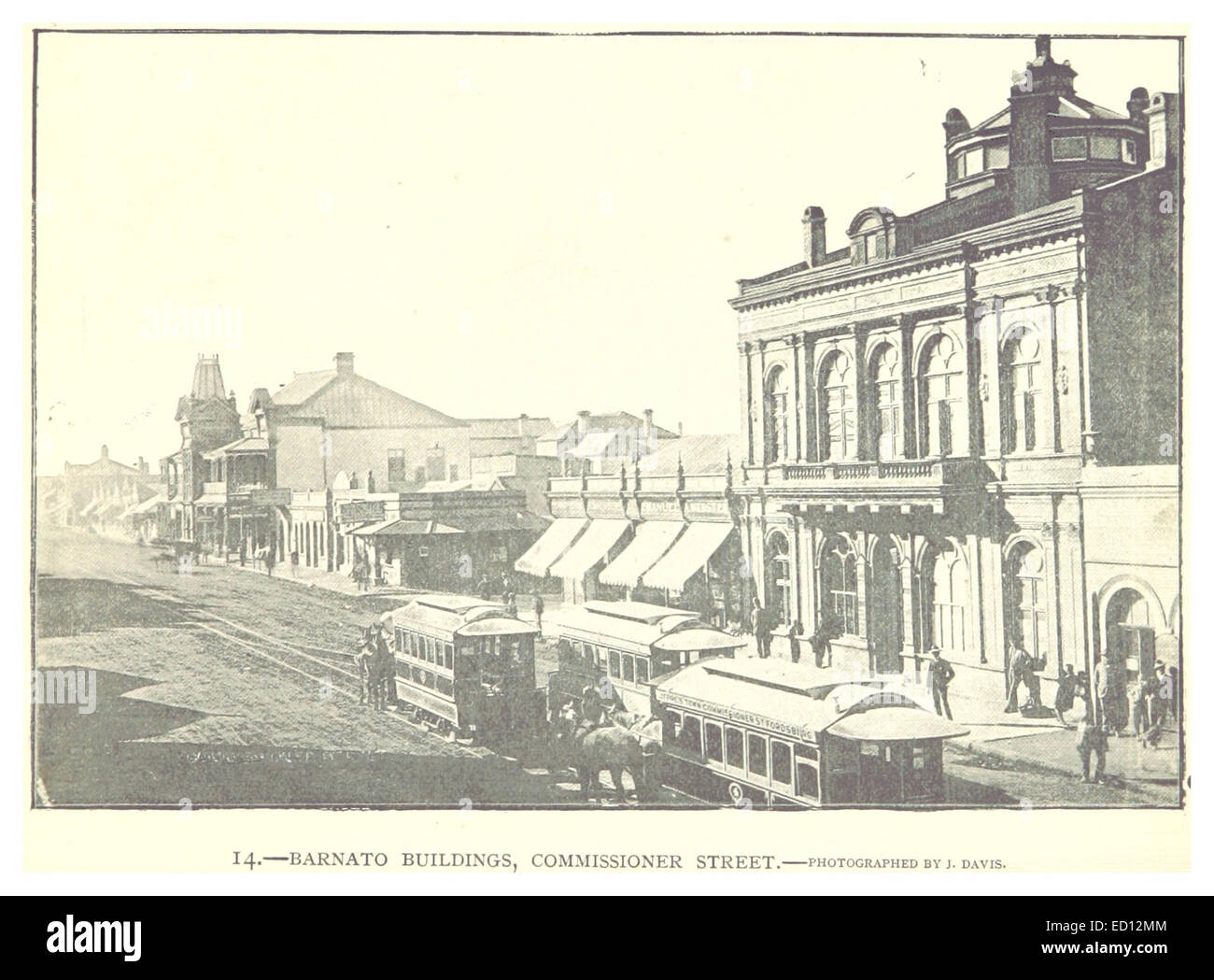 Diese 1893 gezeigte Abbildung der Commissioner Street in Johannesburg zeigt die Barnato-Gebäude, wichtige Bauwerke für die städtische Entwicklung der Stadt. Stockfoto
