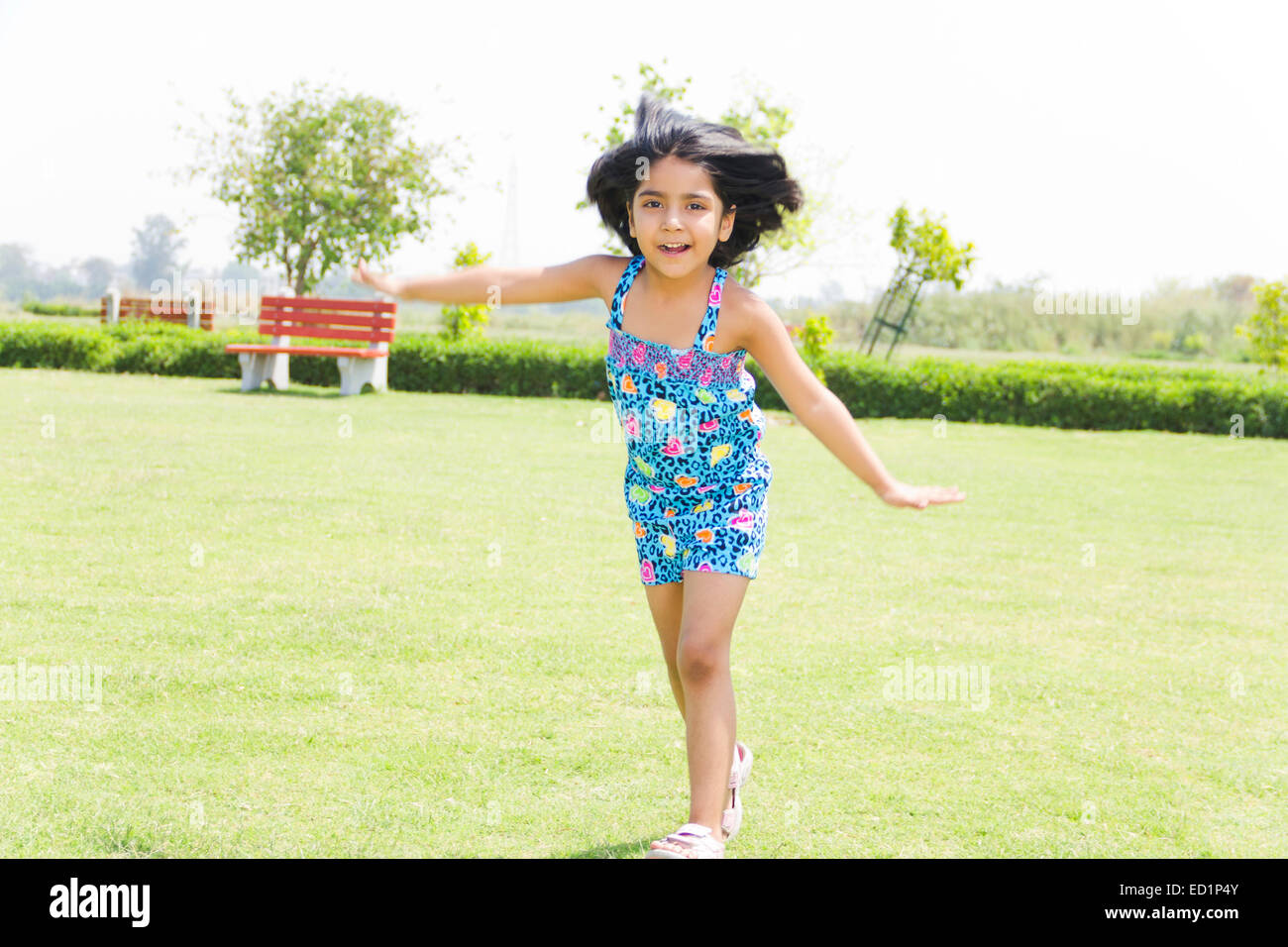1 Indianer schönes Kind Mädchen Park Spaß Stockfoto