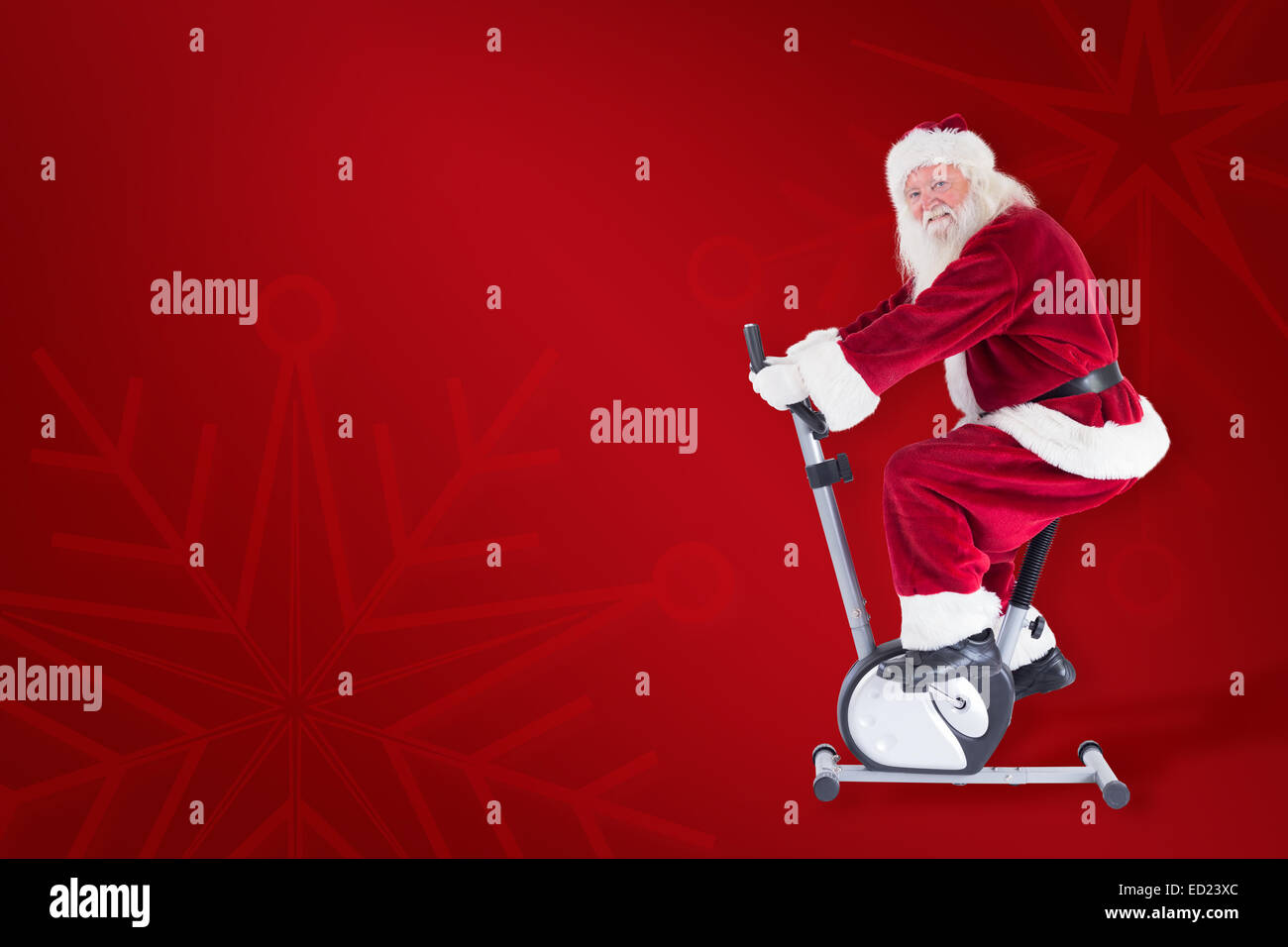 Zusammengesetztes Bild von Santa nutzt ein Hometrainer Stockfoto