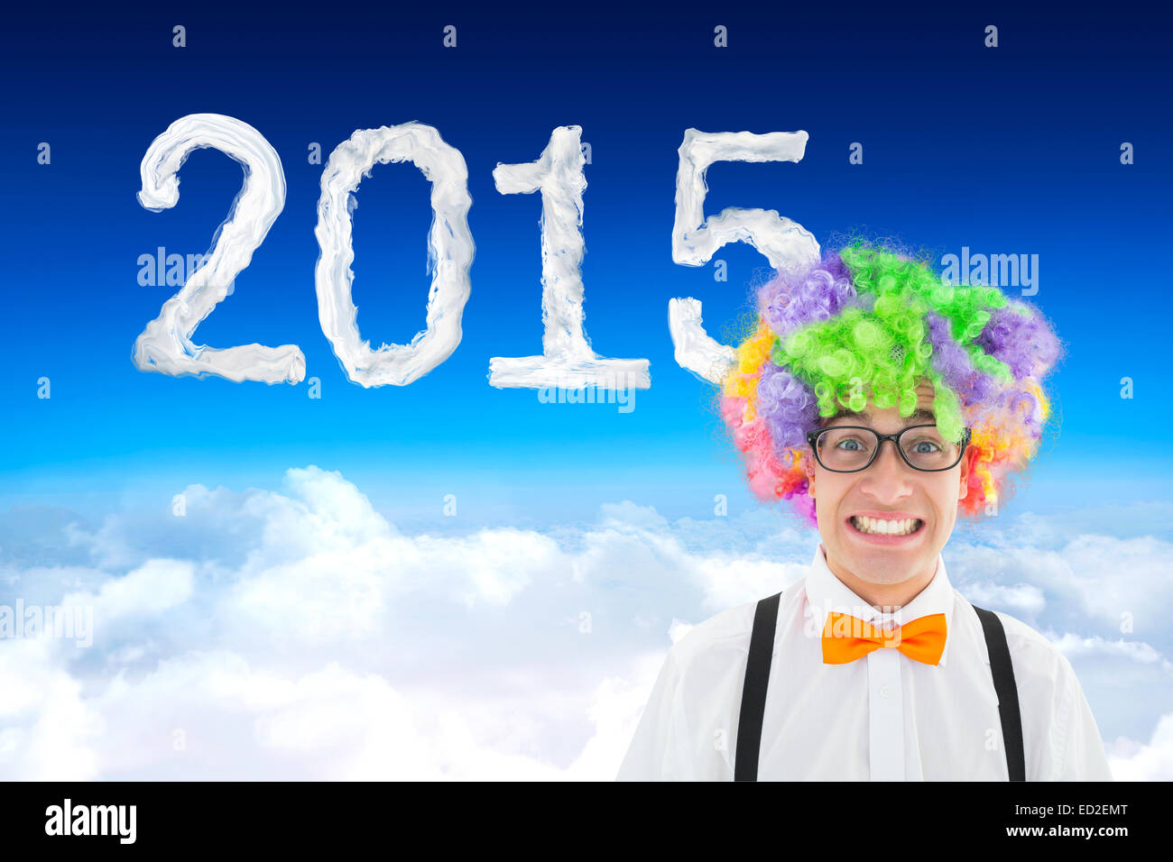 Zusammengesetztes Bild der Geek in Afro Perücke Stockfoto