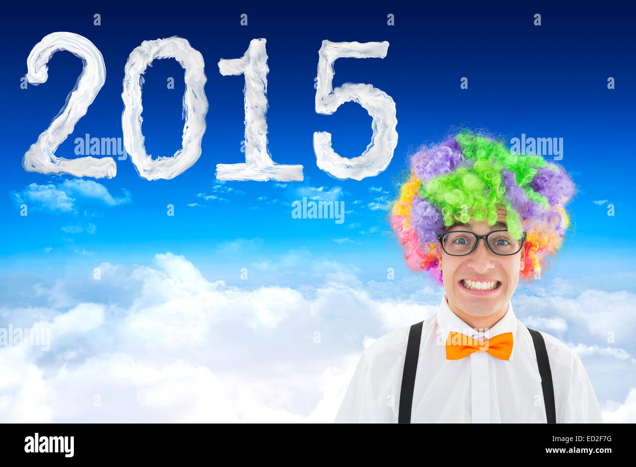 Zusammengesetztes Bild der Geek in Afro Perücke Stockfoto