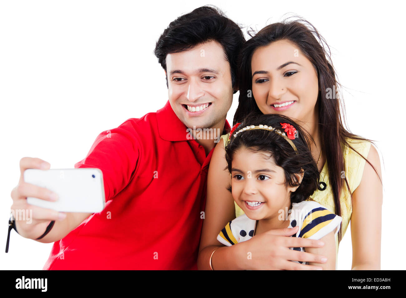indische Eltern mit Kind Telefon Selfie Stockfoto