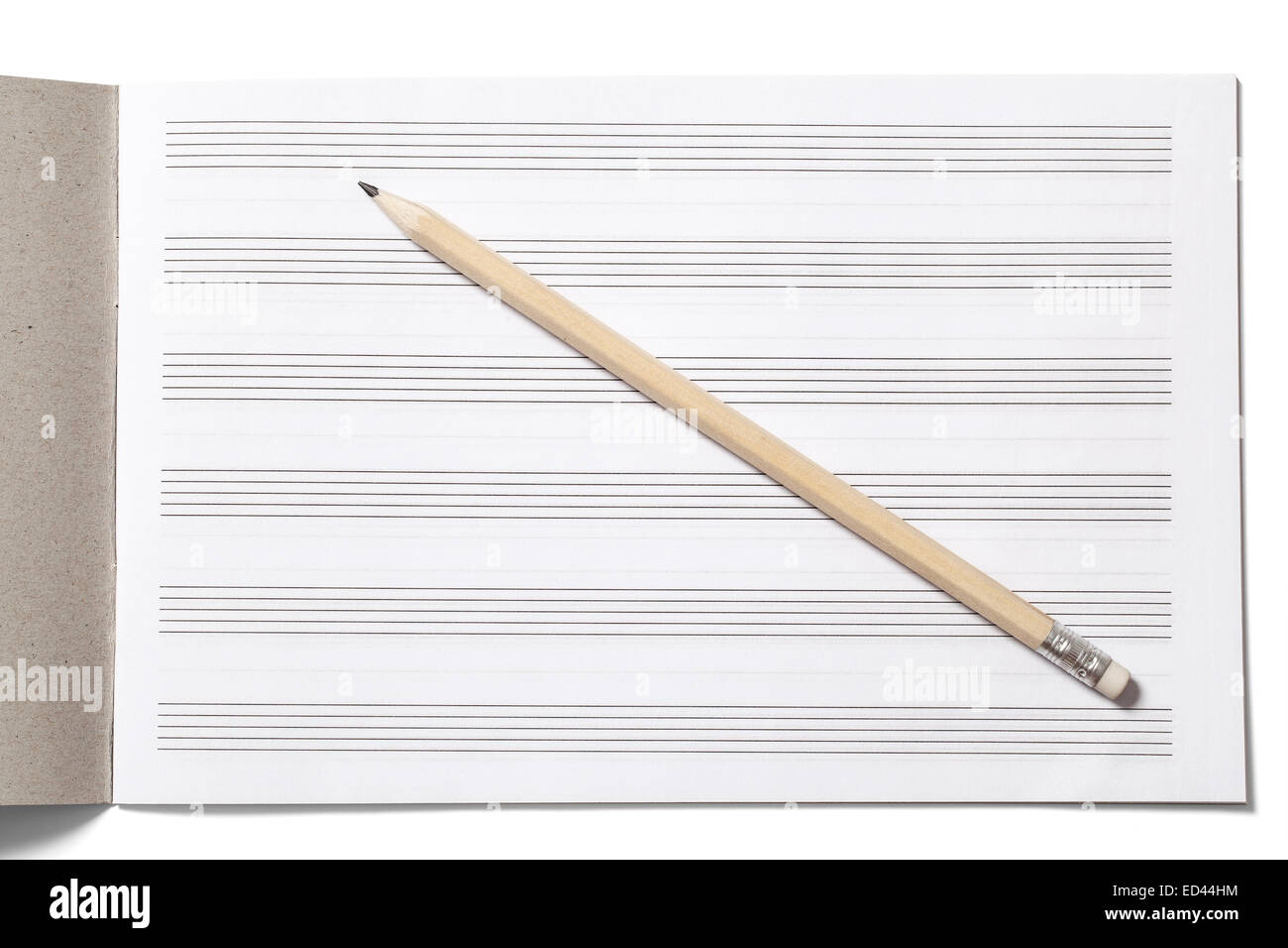 Notizbuch für Musiknoten und Bleistift auf weiß Stockfoto