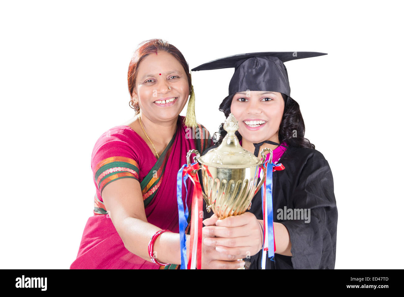 indische Mutter mit Tochter-Trophy-Sieg Stockfoto