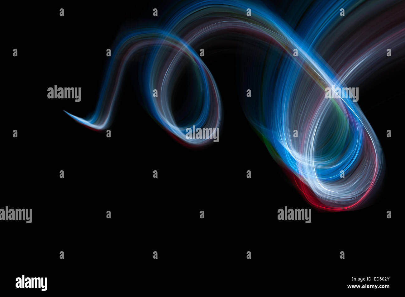 wirbelnde Bewegung und Loipen Spuren von moving-Lights erstellen Muster von Vortice mit Spinnen Stockfoto