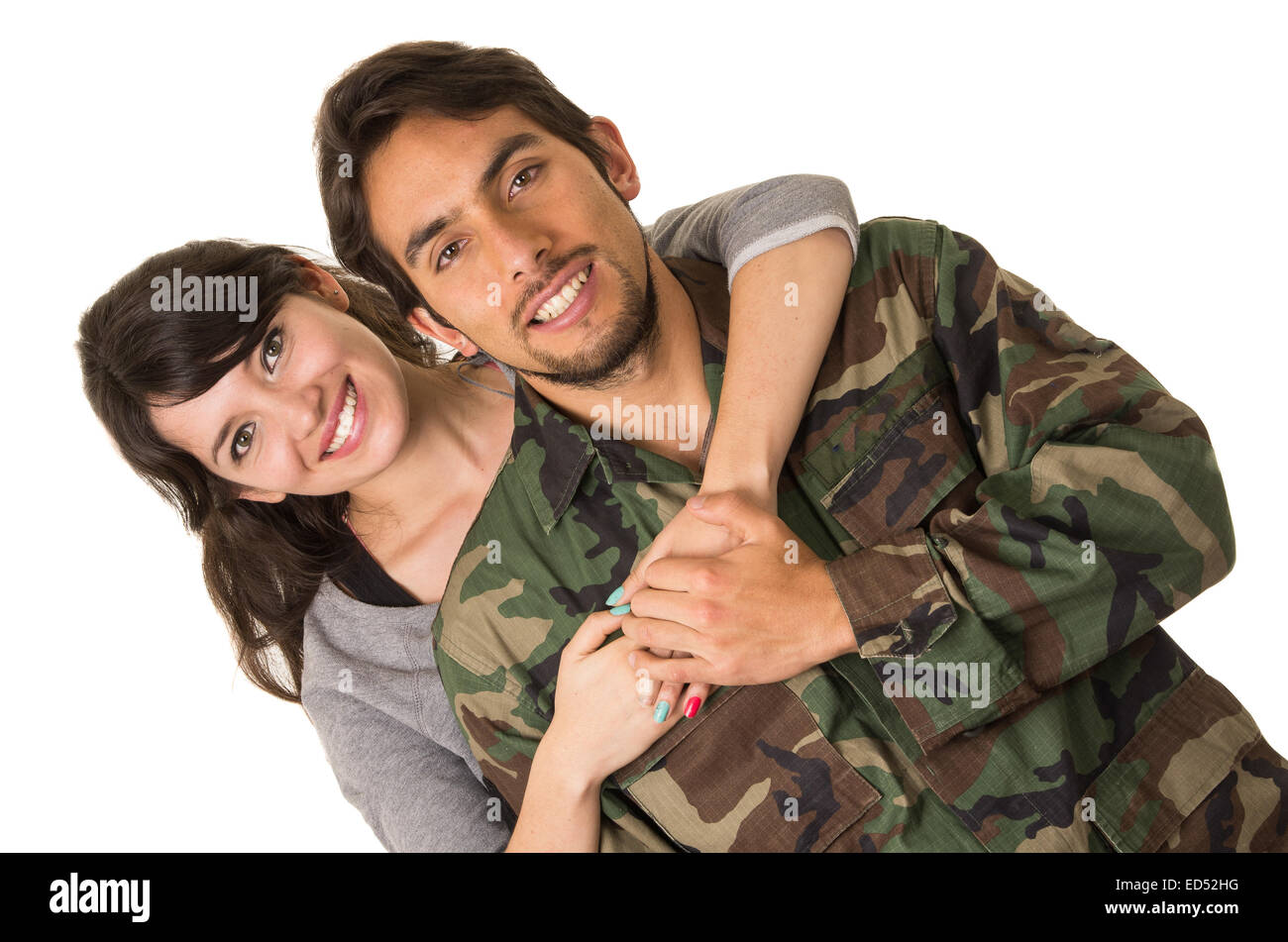 junger Militär Soldat kehrt zurück, um seine Frau Freundin treffen Stockfoto