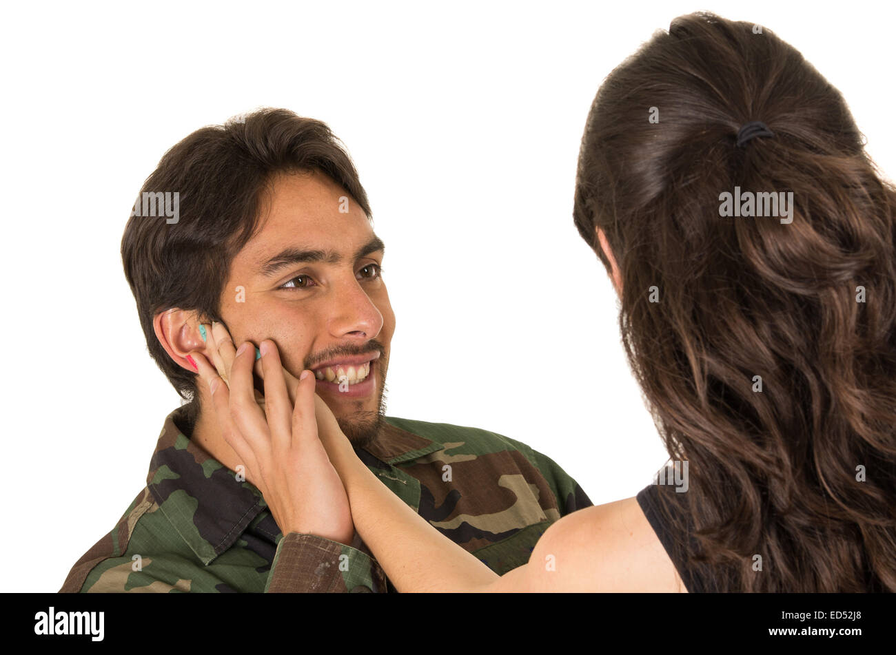 junger Militär Soldat kehrt zurück, um seine Frau Freundin treffen Stockfoto