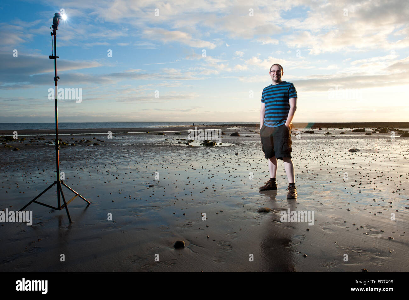 hinter der Kamera Flash-Beispiel mit Blitz zeigt im Bild am Strand Stockfoto