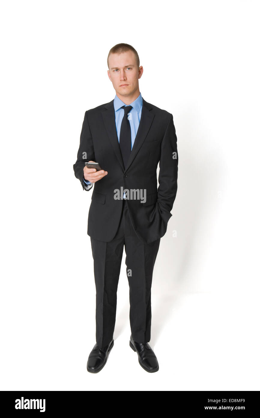 Junge Mann tragen Anzug mit elektronischen Gerät, nicht in Militäruniform siehe Bild EDMF6, EDMF4, oder EDMF3 für andere Kleidung Stockfoto