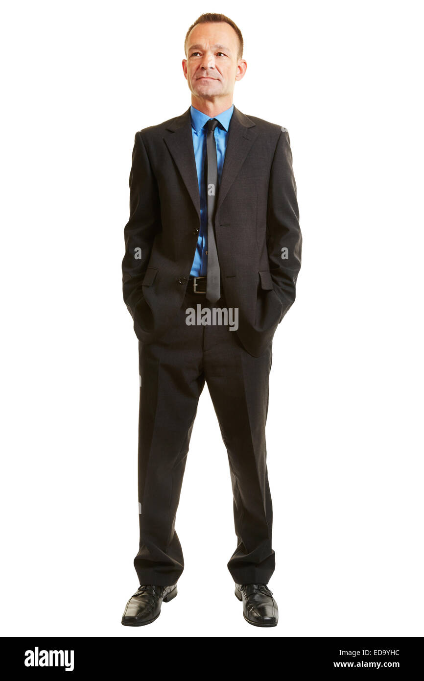 Isolierte Ganzkörper Geschäftsmann stehen und blickte nachdenklich in einem Anzug Stockfoto
