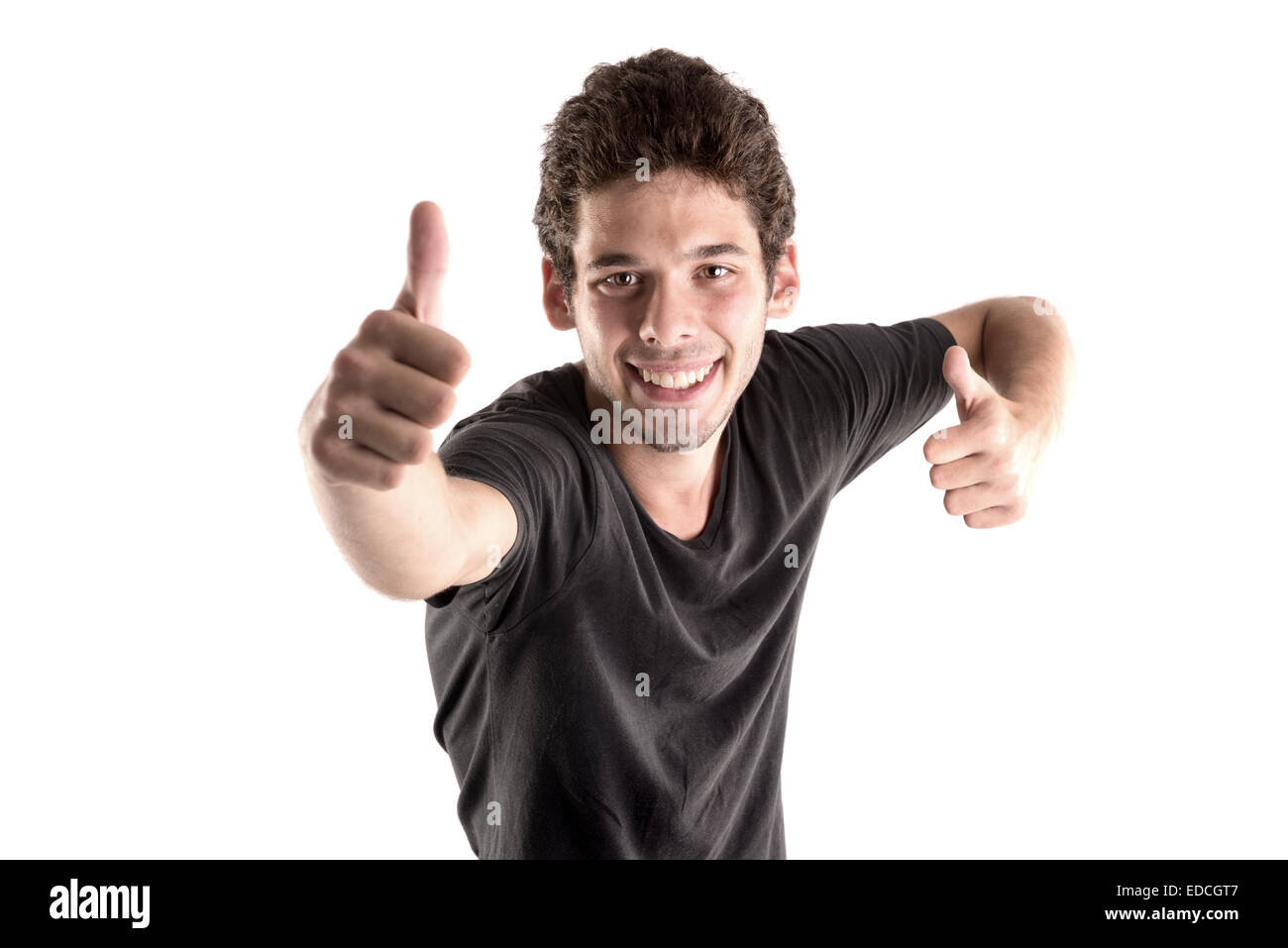 Glückliche junge legerer Mann posiert in weiß isoliert Stockfoto
