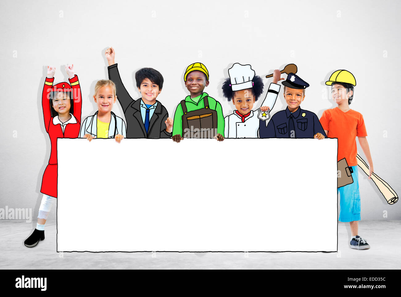 Gruppe von Kindern in Träume Job einheitliche Holding Banner mit Textfreiraum Stockfoto
