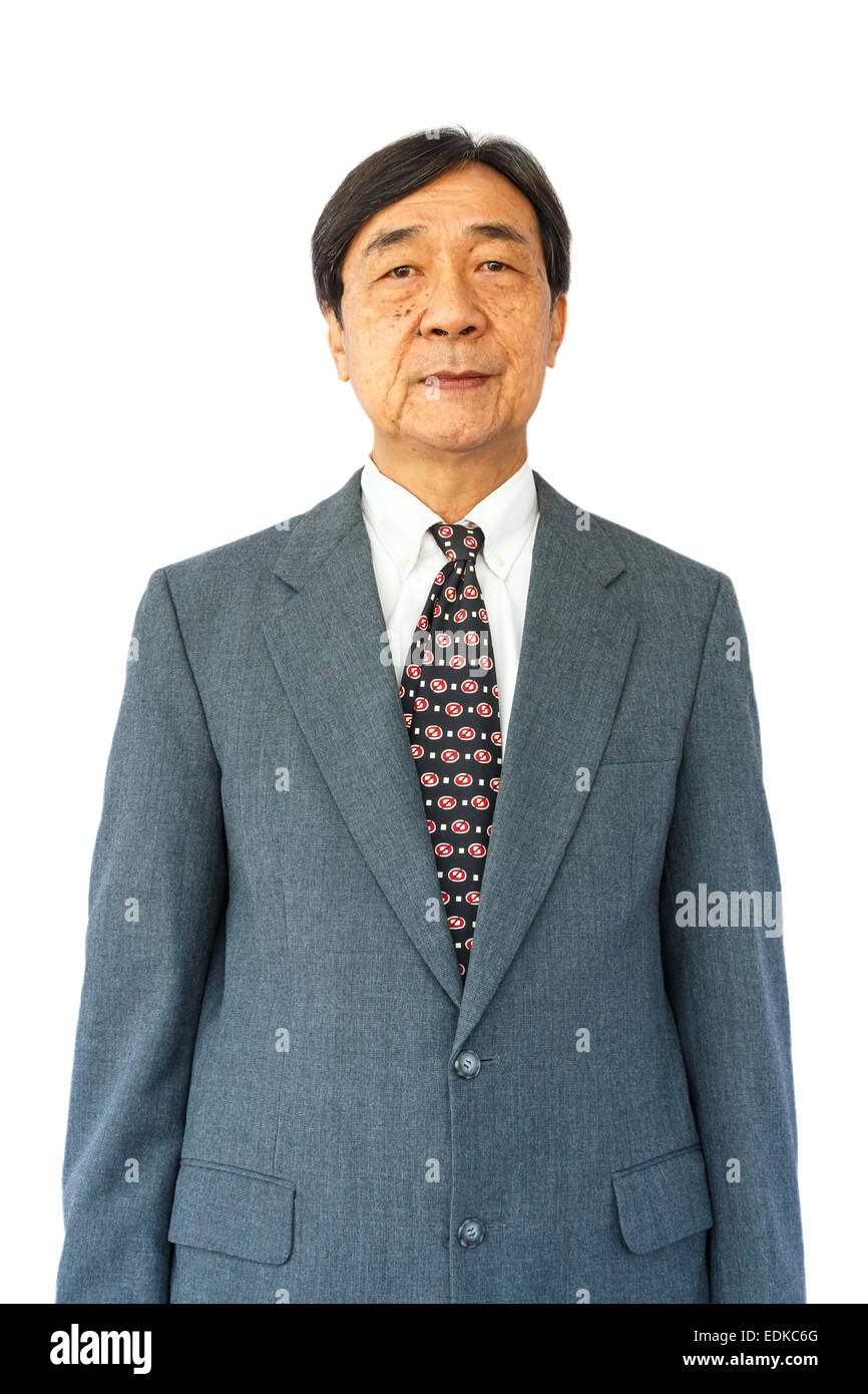 alte alte thailändische Geschäftsmann steht und auf der Suche auf weißen background(isolated) Stockfoto