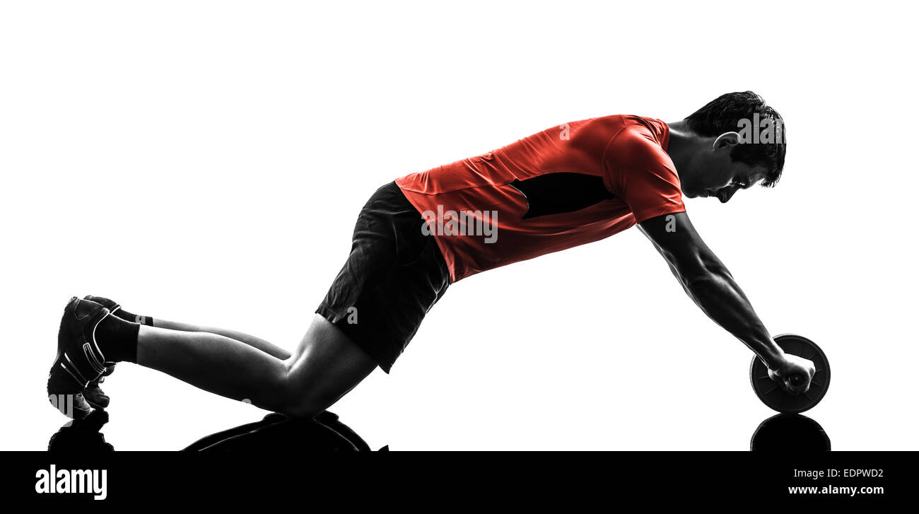 ein Mann trainieren Fitness Training Bauch straffende Rad Silhouette auf weißem Hintergrund Stockfoto
