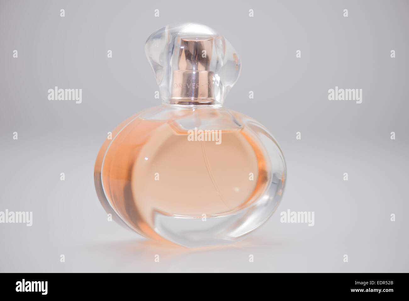 Parfum Flasche gelb orange Stockfotografie - Alamy