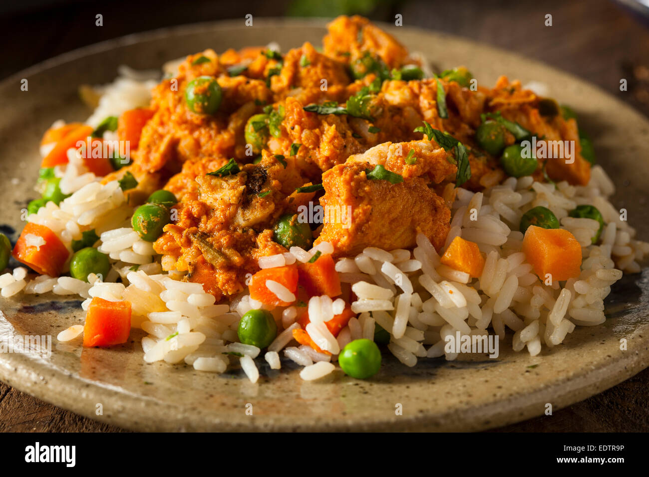 Hausgemachte Chicken Tikka Masala mit Reis und Naan Stockfoto