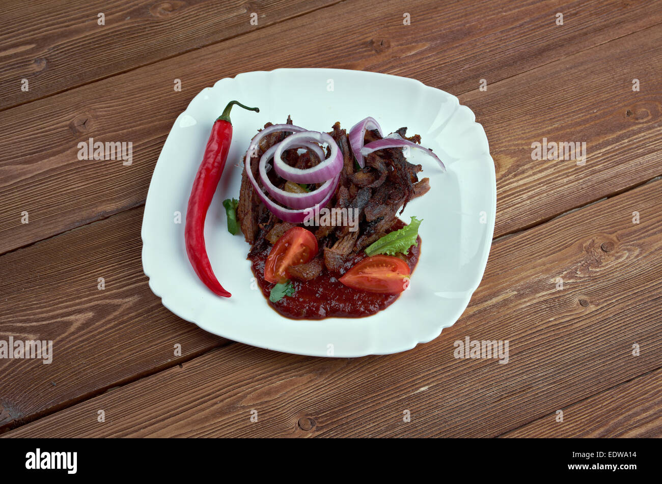 Cochinita Pibil - traditionelle mexikanische langsam gegartes Schweinefleisch Gericht aus der Yucatan-Halbinsel von Maya-Ursprung Stockfoto