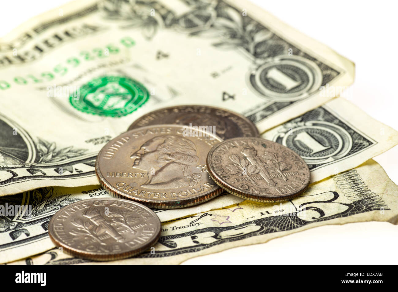 US-Dollar-Banknoten und-Münzen Stockfoto