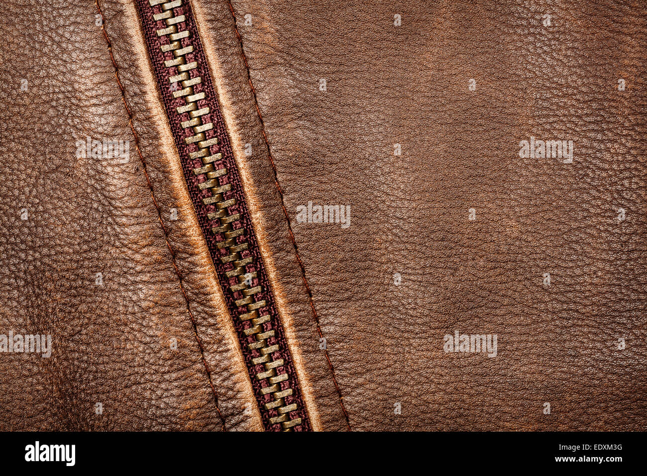 Braun Leder-Textur und Reißverschluss-Hintergrund Stockfoto