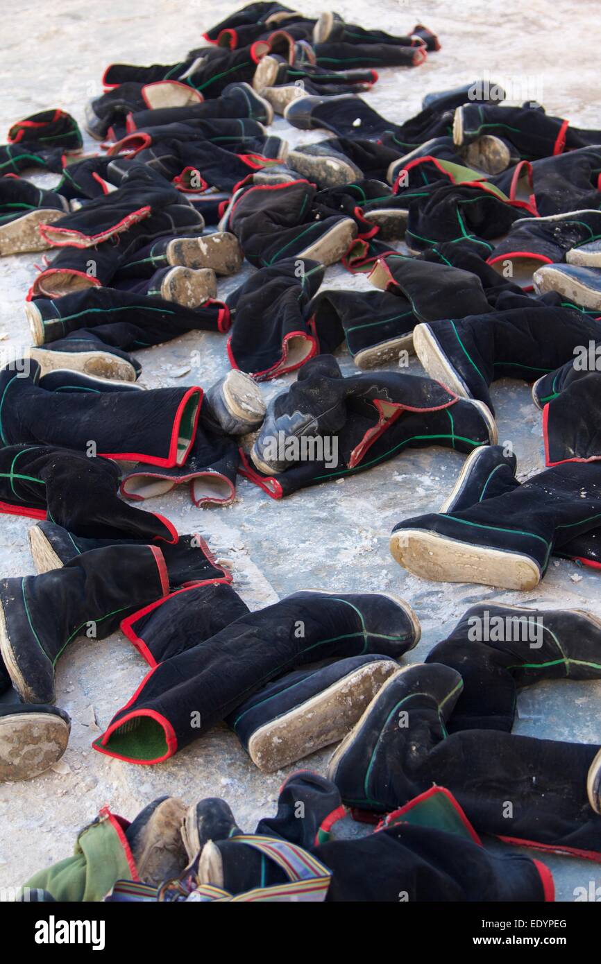 Monks Schuhe in Labrang Kloster Stockfoto