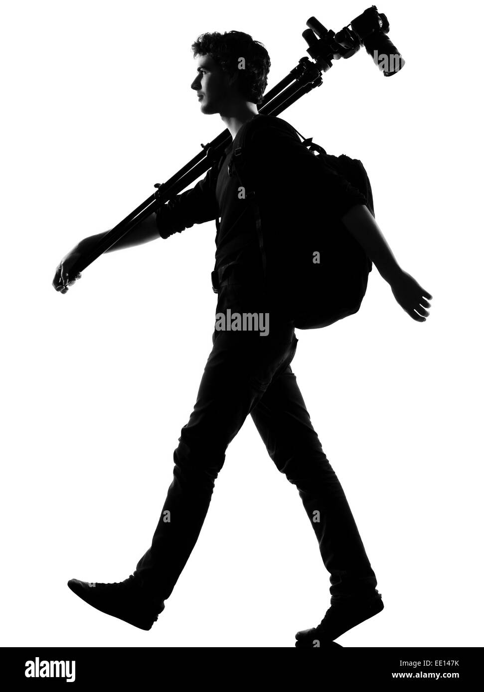 junger Mann Fotograf Silhouette im Studio isoliert auf weißem Hintergrund Stockfoto