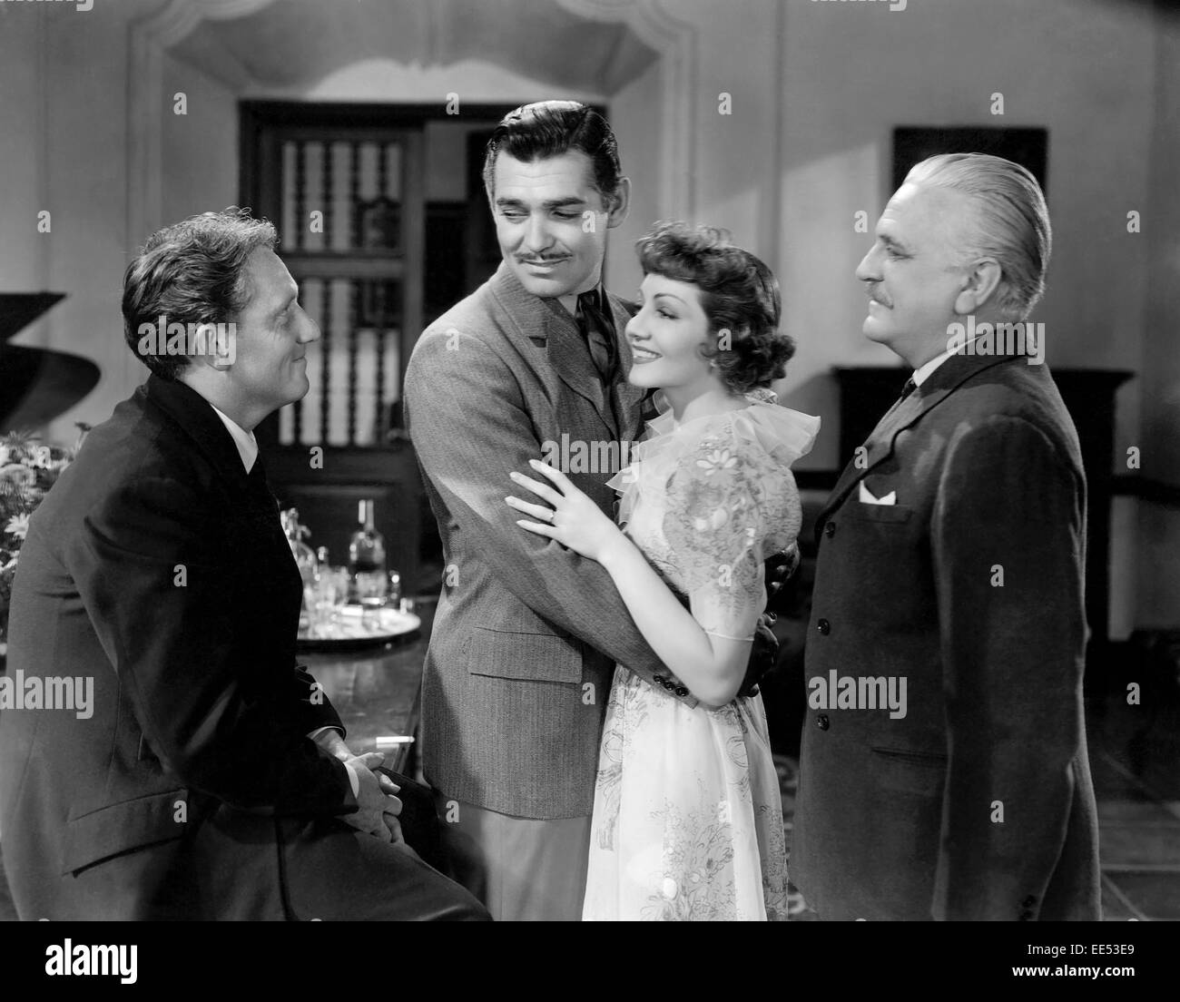 Spencer Tracy, Clark Gable, Claudette Colbert, Frank Morgan, am Set des Films "Boomtown", 1940 Stockfoto