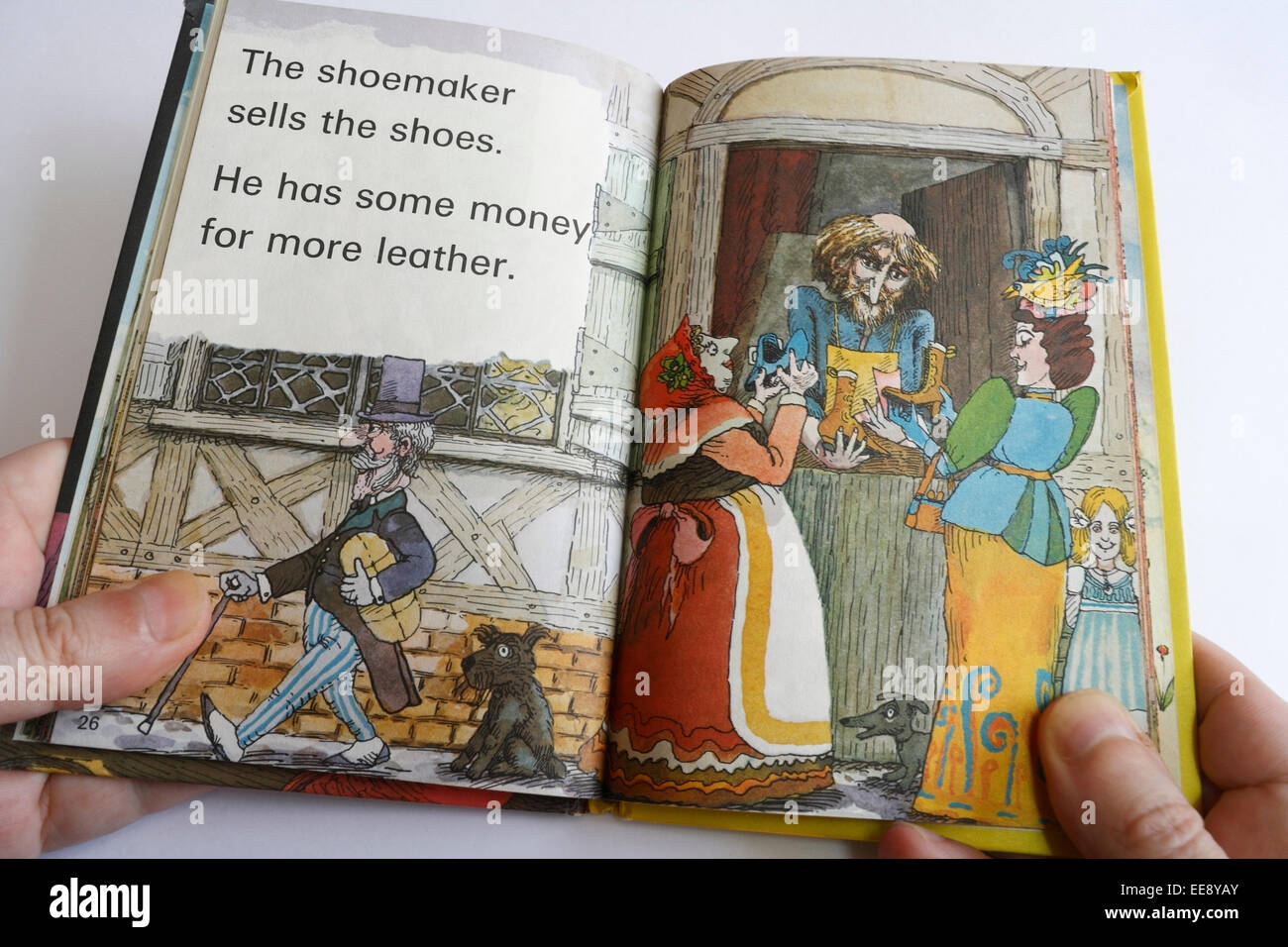 Person mit einem Marienkäfer Kinder Buch lesen. Lesen lernen Stockfoto