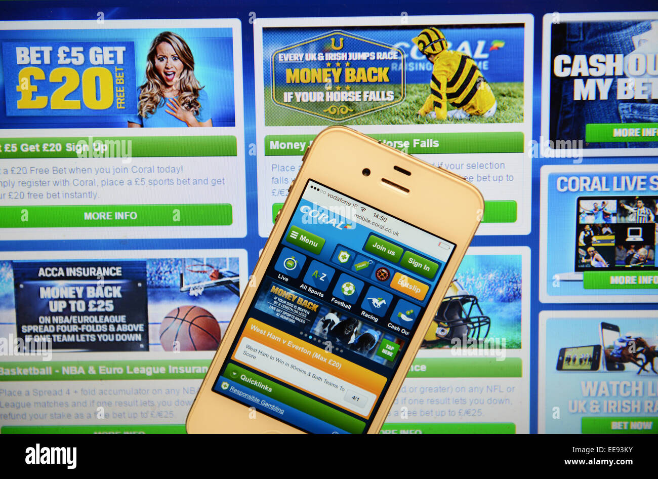 Coral-Website und IPhone Stockfoto