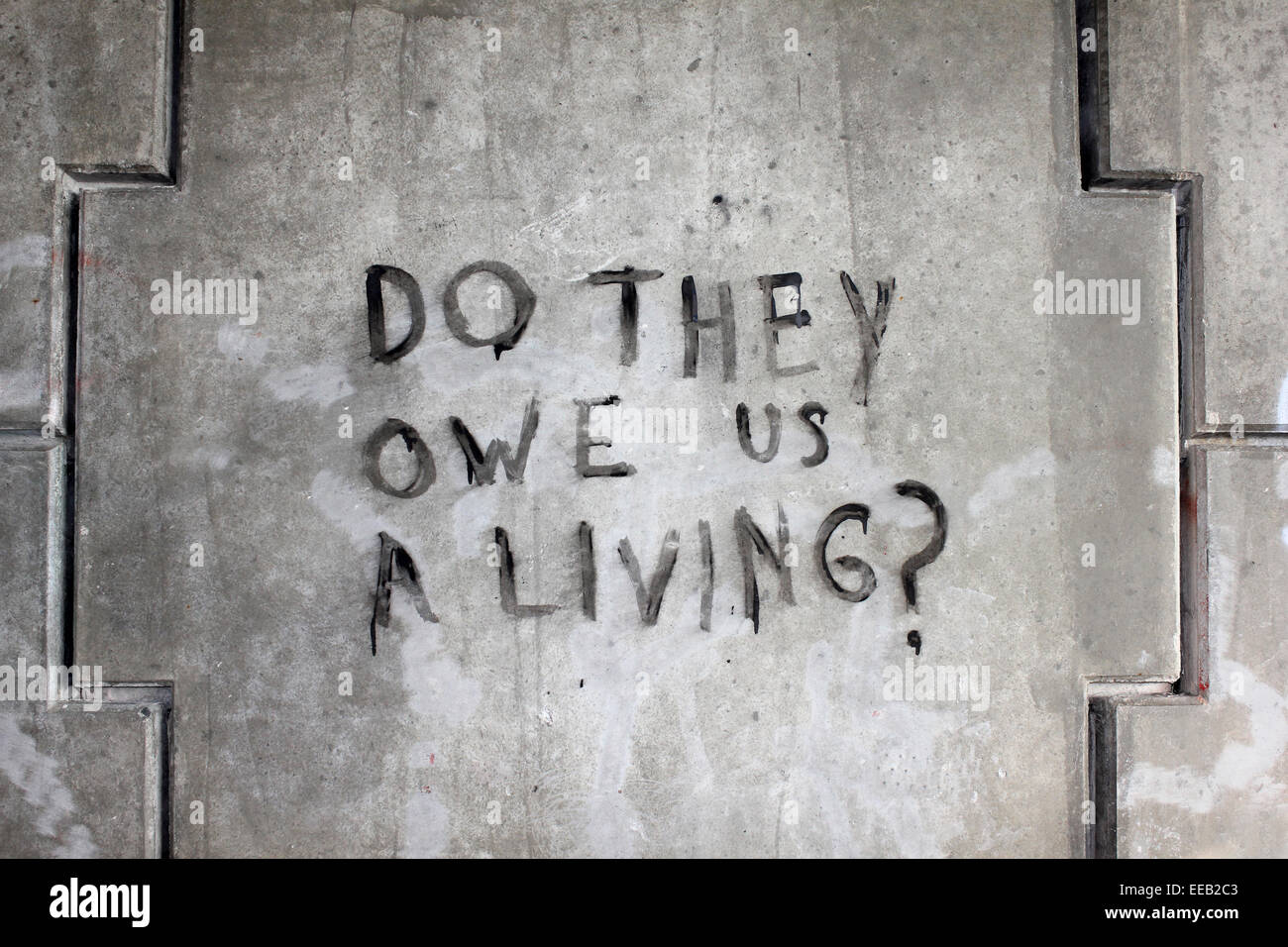 Urban Graffiti "tun sie Schulden uns Leben?" Stockfoto