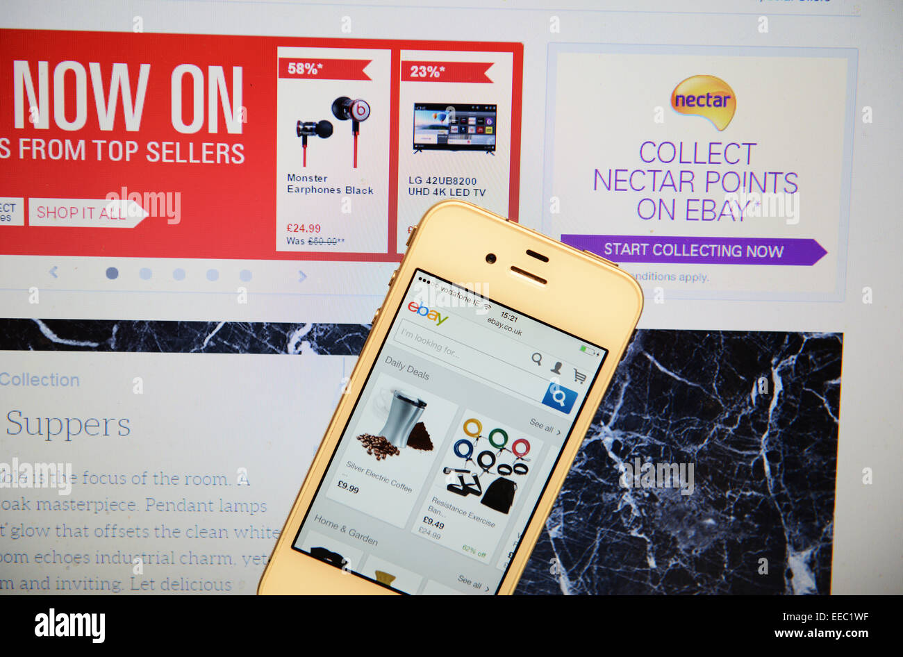 EBay-Website und IPhone Stockfoto