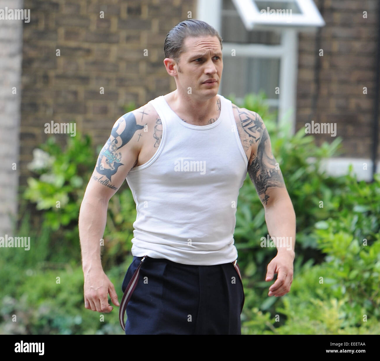 Tom Hardy Dreharbeiten Szenen am Set von "Legend" Featuring: Tom Hardy wo:  London, Vereinigtes Königreich bei: 14. Juli 2014 Stockfotografie - Alamy