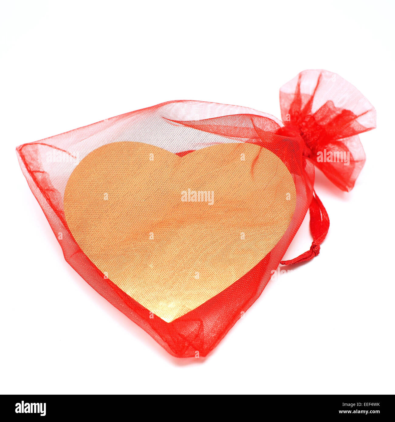 Goldenes Herz in rot Beutel für Valentinstag Geschenk Stockfoto Goldenes Herz in rot Beutel für Valentinstag Geschenk Stockfoto