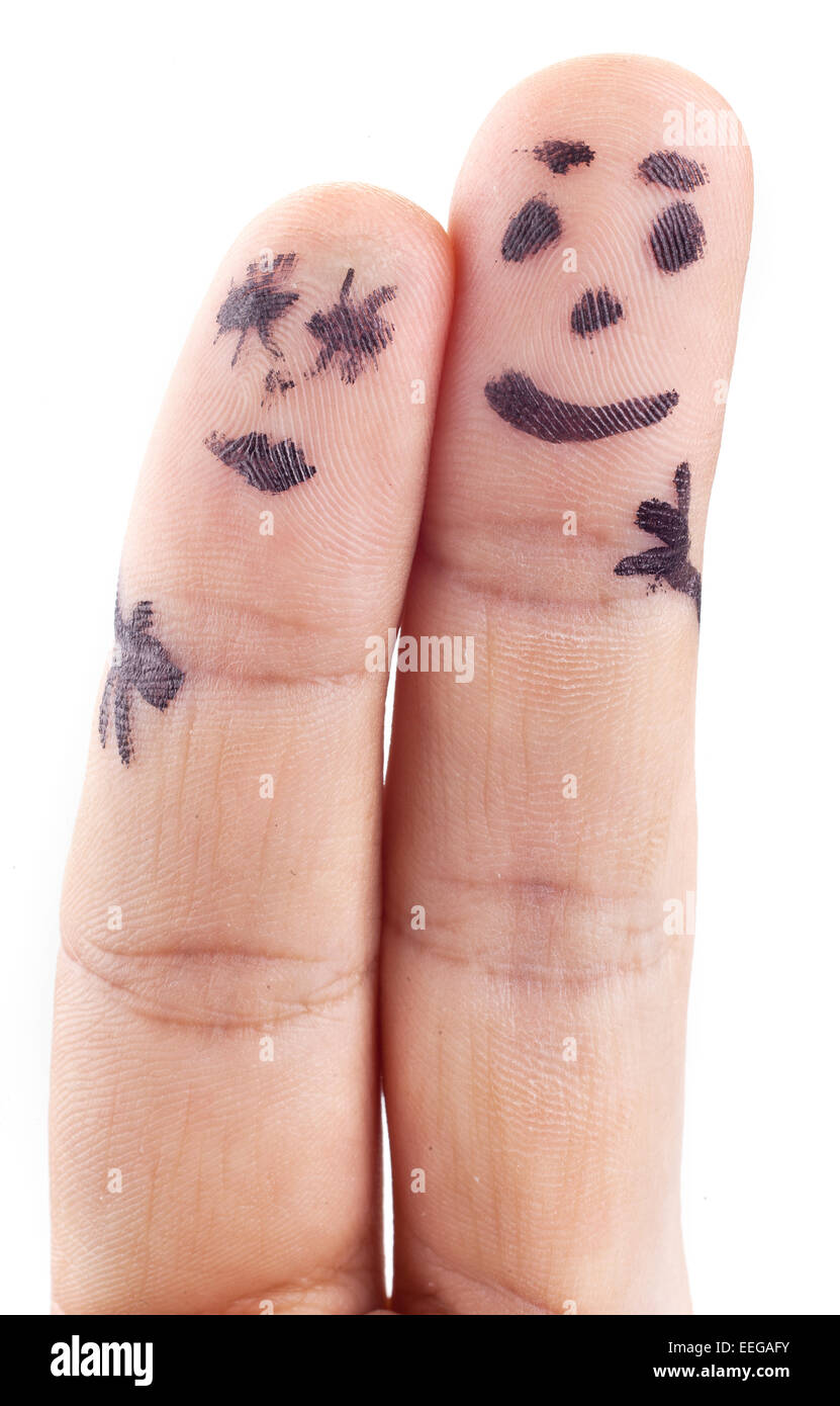 Paar Smiley auf Mannes Fingern gemalt. Stockfoto