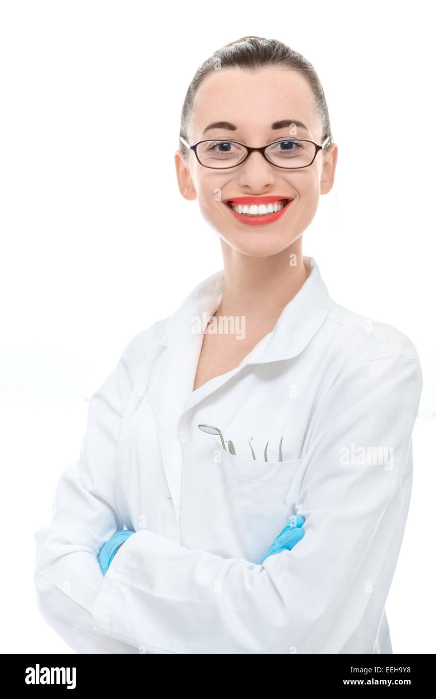 Junge Ärztin mit Brille, Blick in die Kamera auf weißem Hintergrund Stockfoto