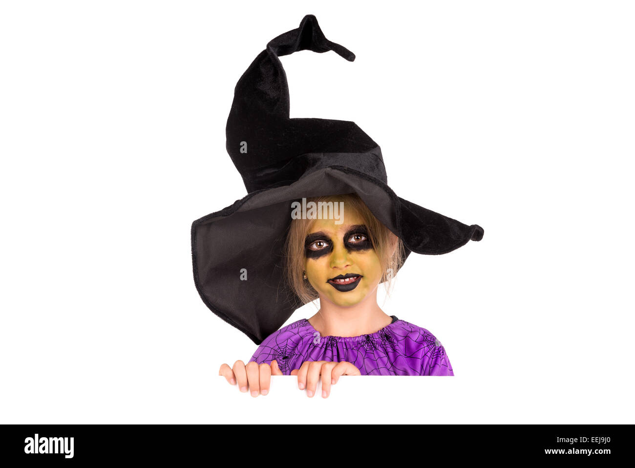 Mädchen mit Gesicht malen und Halloween Hexe Kostüm über eine weiße