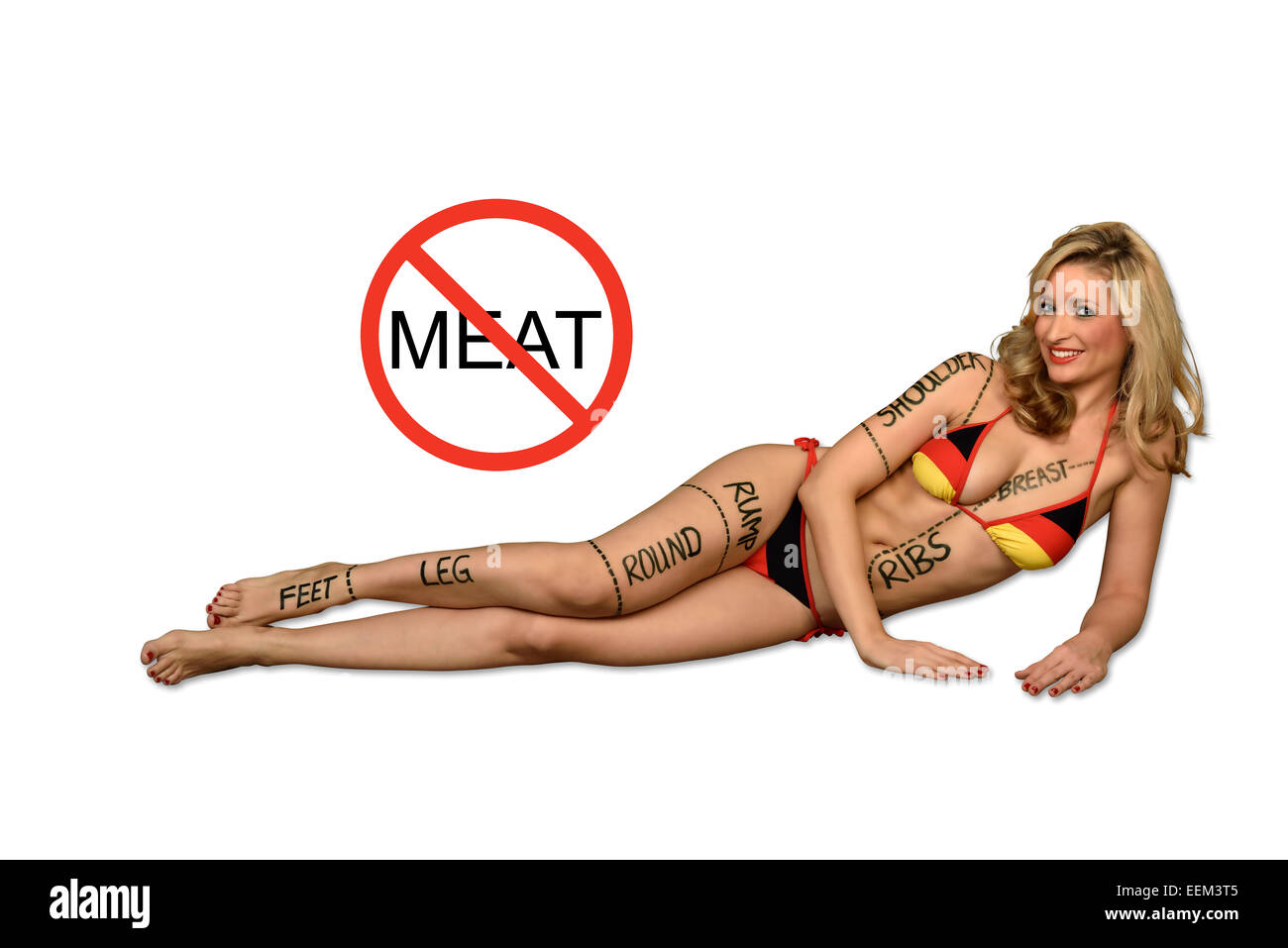 Symbolisches Bild für Vegetarismus oder Veganismus, junge Frau mit einem Bikini in den Nationalfarben Deutschlands, die Namen der Stockfoto