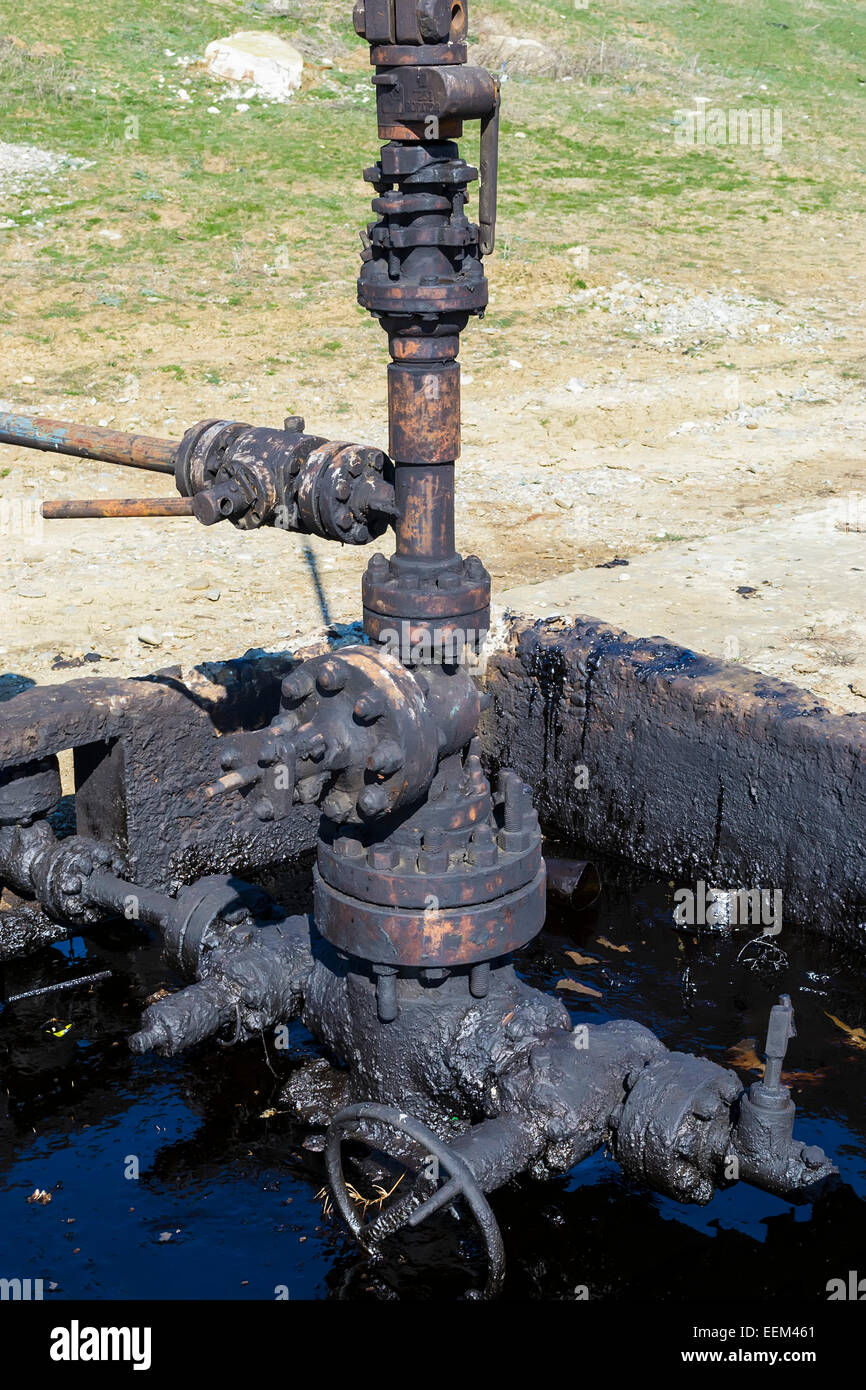 Kreuzung der fettigen Ölleitungen und Ölpest in einer Extraktion-perimeter Stockfoto