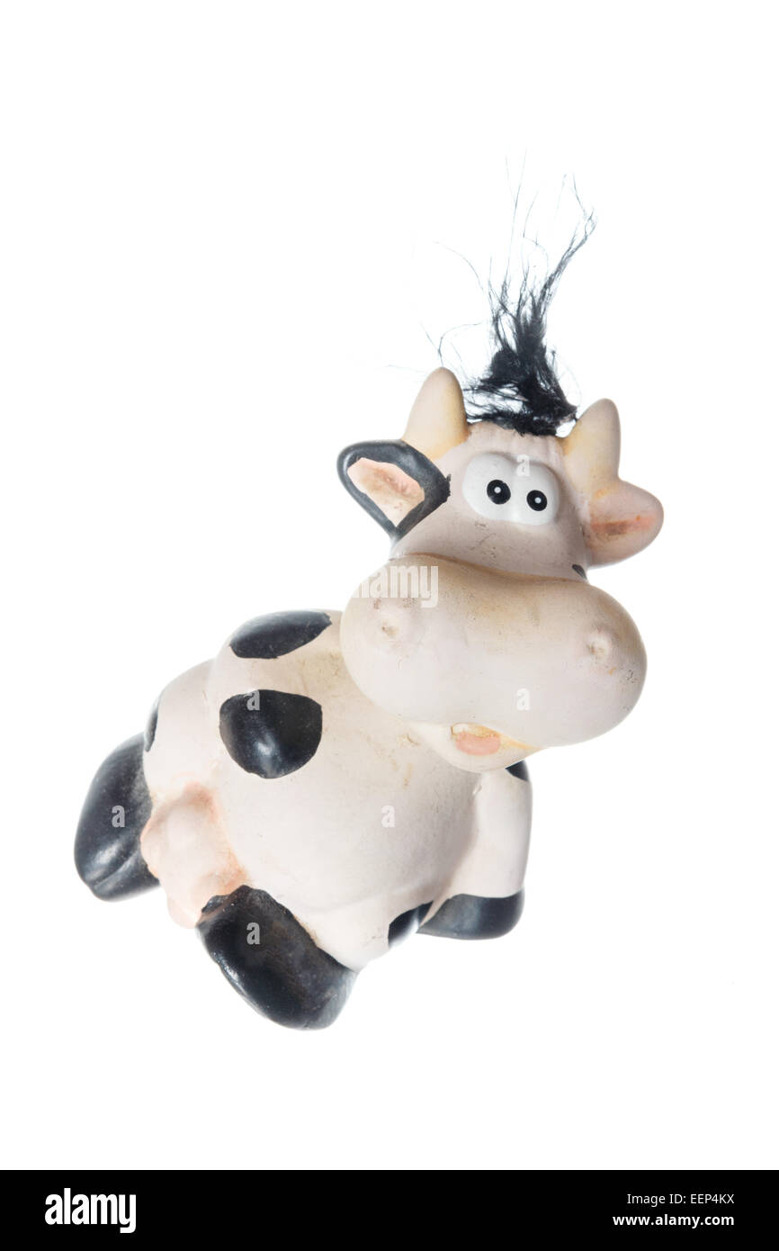 Fanny-Foto von schwarzen und weißen Kuh Spielzeug. Objekt isoliert auf weißem Hintergrund ohne Schatten Stockfoto
