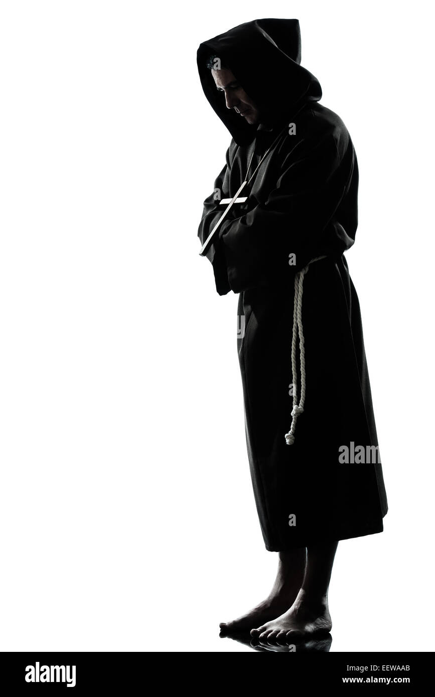 ein kaukasischer Mann Priester beten Silhouette im Studio isoliert auf weißem Hintergrund Stockfoto