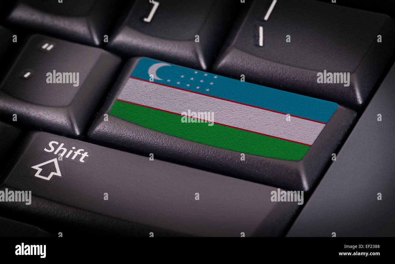 Flagge auf Schaltfläche Tastatur, Flagge der Republik Usbekistan Stockfoto